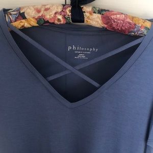 T shirt with cris cross on front. New!!